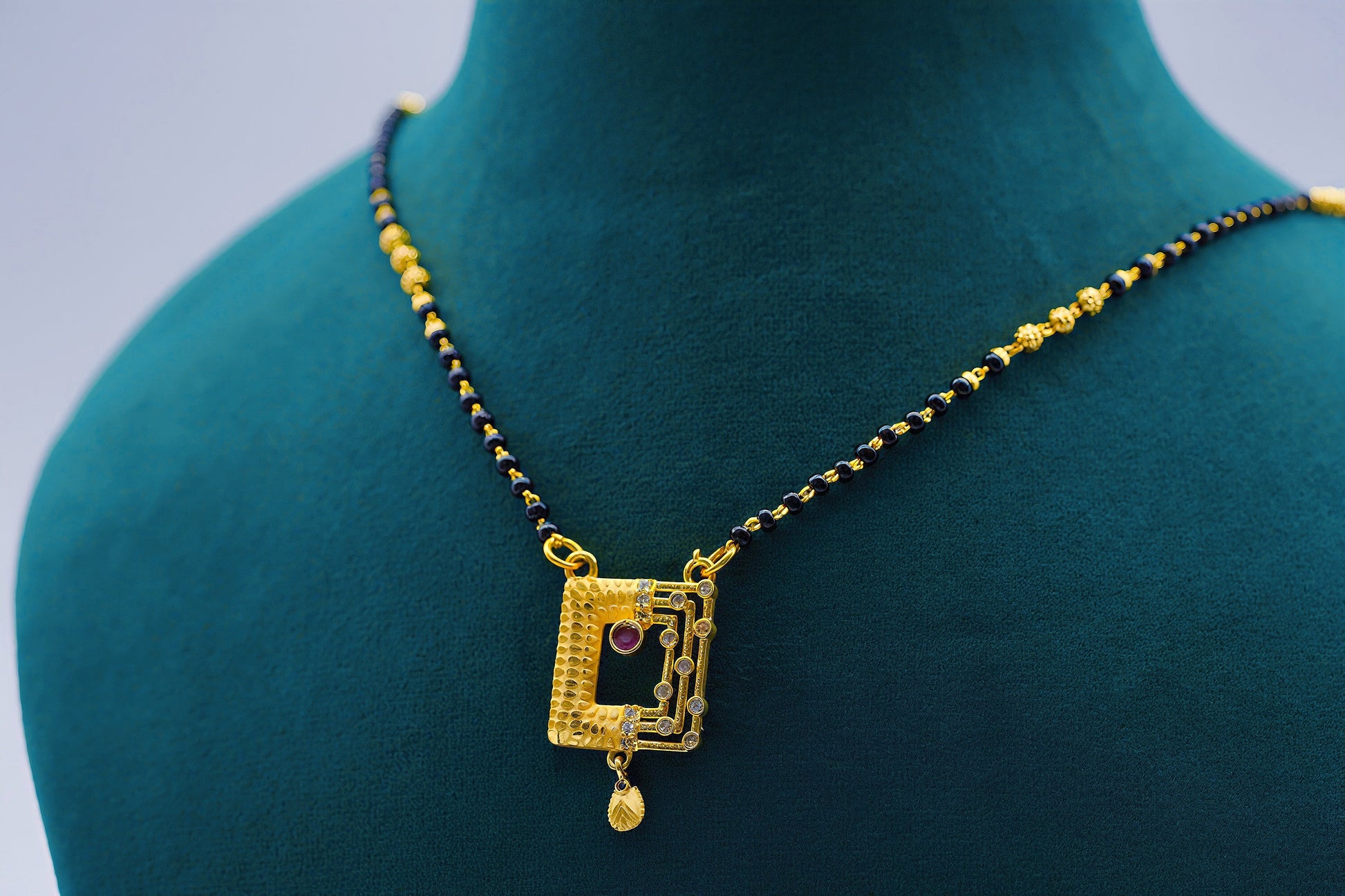 Gold Tone Mangalsutra with Studded Stone Pendant - OY JEWELLS - 